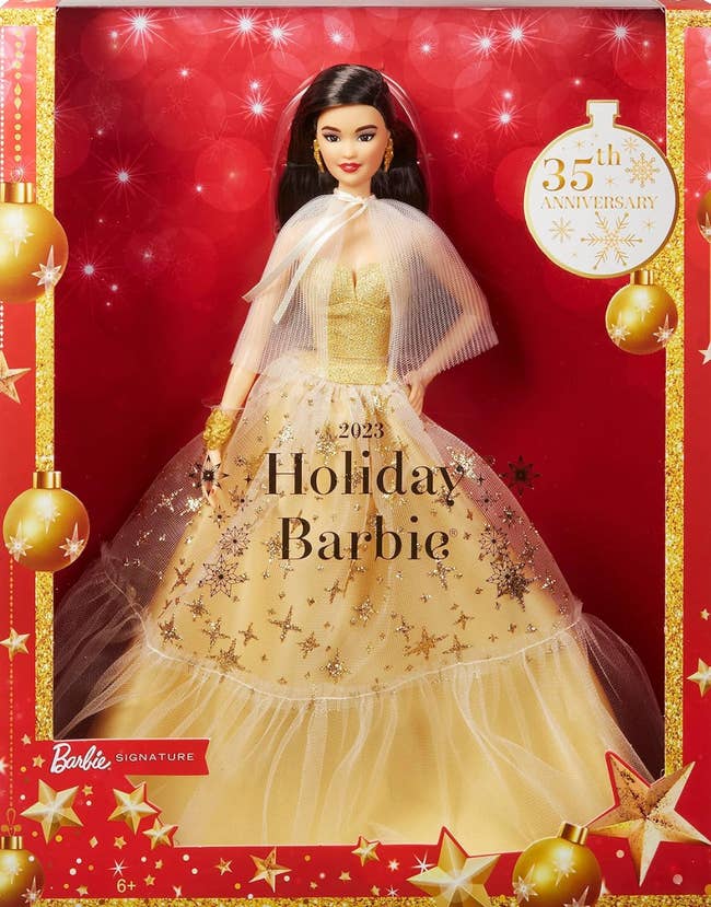 the brunette Barbie in a red holiday box