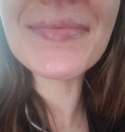 reviewer's after photo with moisturizied, smooth lips