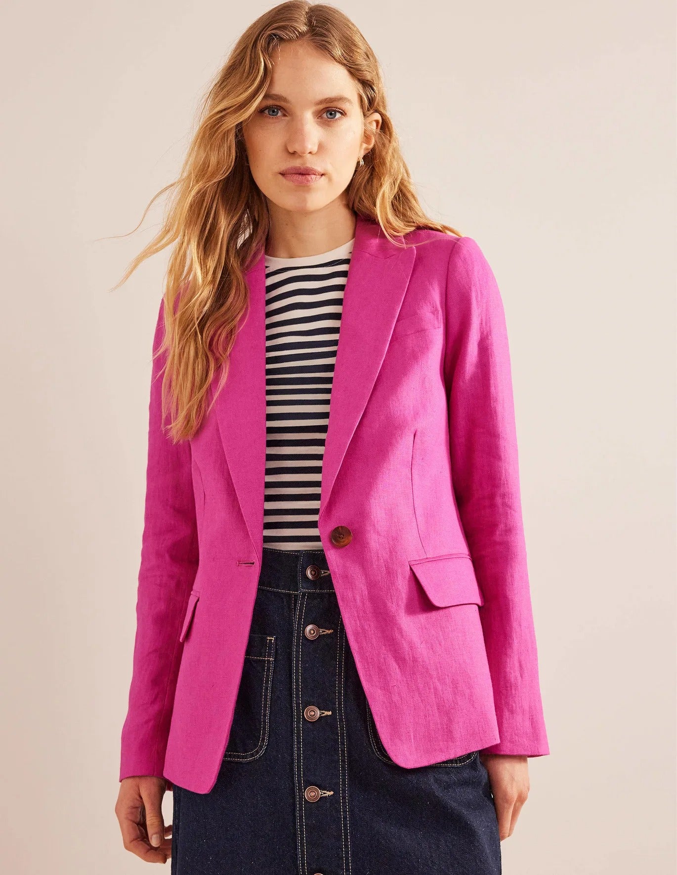 model in hot pink one button blazer