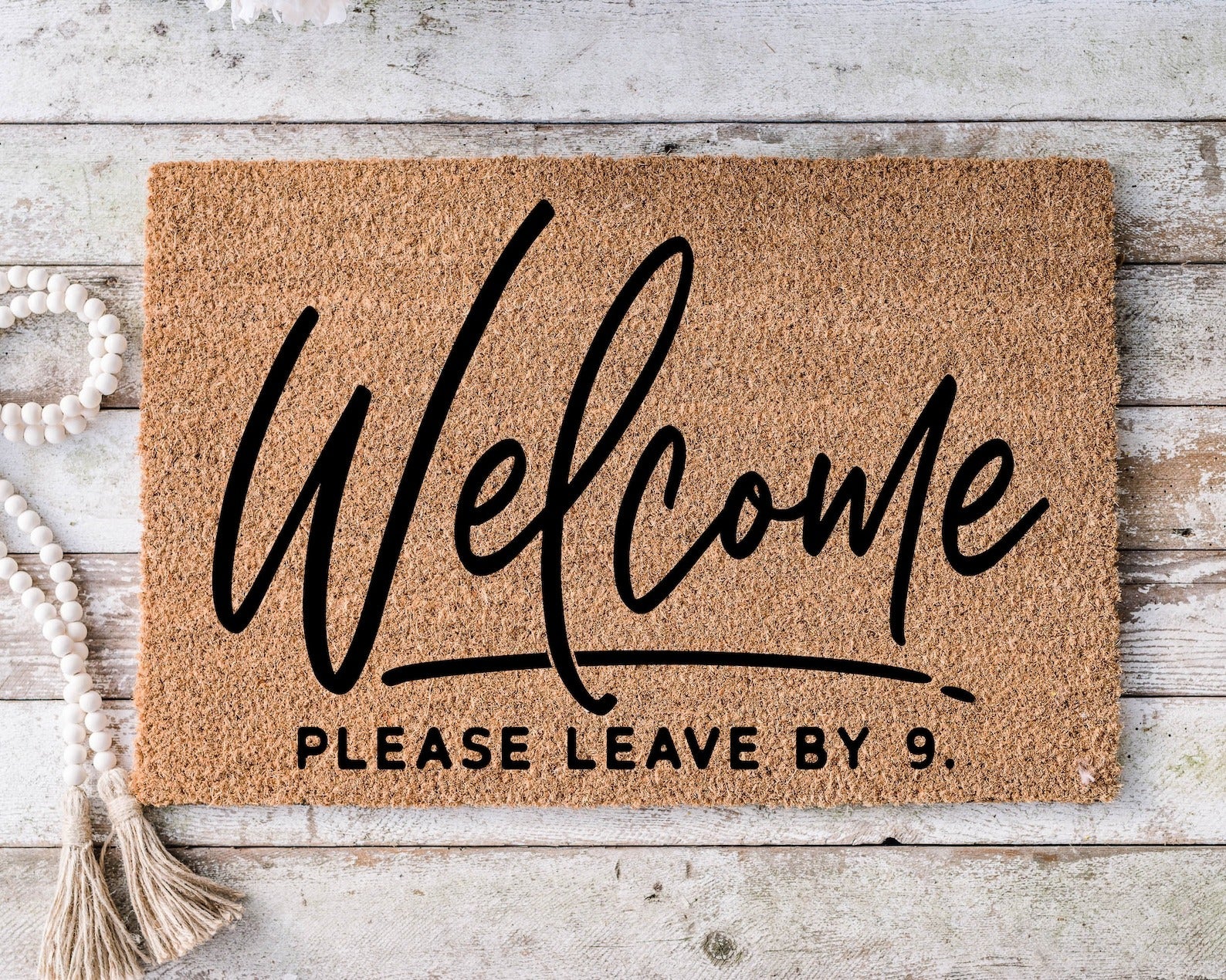 the doormat that says 