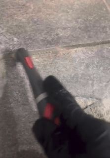gif of reviewer cleaning grout with product
