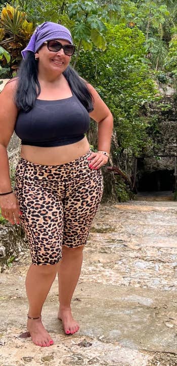 reviewer wearing the leopard print shorts