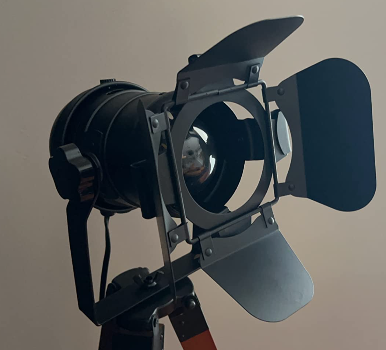 A workplace  spotlight connected  a stand, emblematic  instrumentality  for nonrecreational  photography oregon  filming