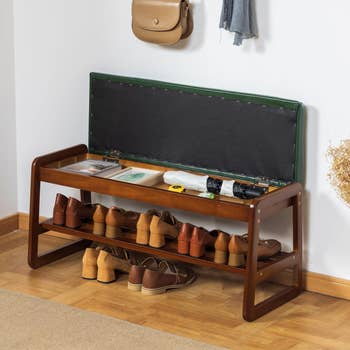 same woody  seat  with cushion flipped up   to amusement   retention  beneath