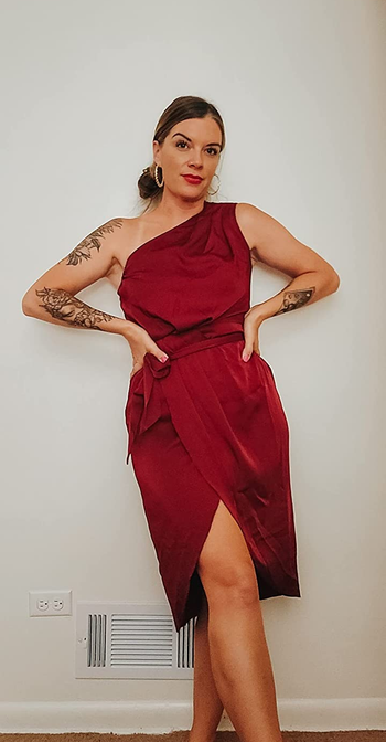 reviewer in the red satin dress