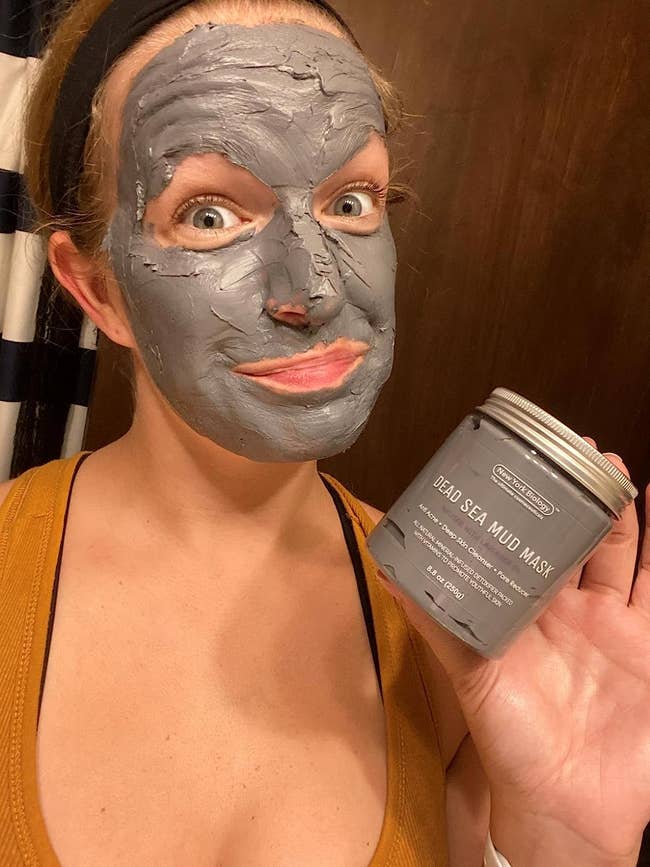 a reviewer wearing a dead sea mud mask