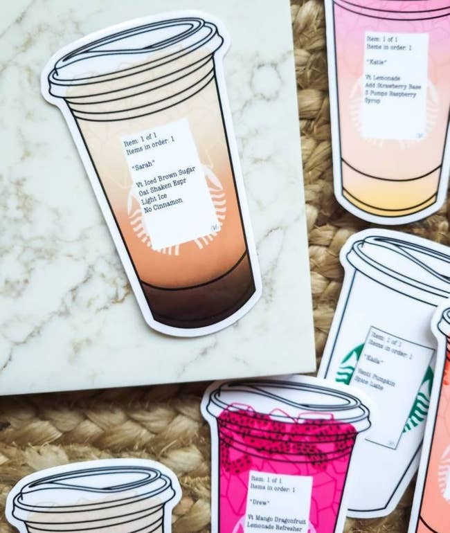 Stickers of Starbucks drinks that have stickers on them with custom orders written out in Starbucks style 
