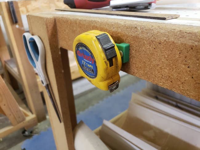 tape measure affixed to hanger