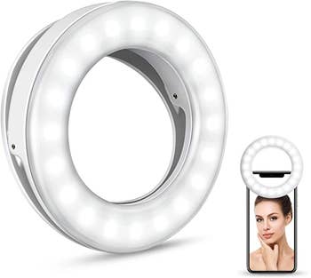 the small circle ring light next to a phone with the ring light on it