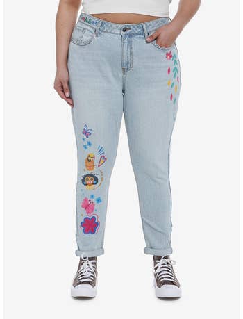 a model wearing encanto themed mom jeans