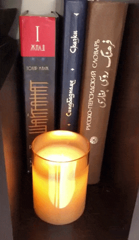 gift showing the candle flickering realistically on a shelf
