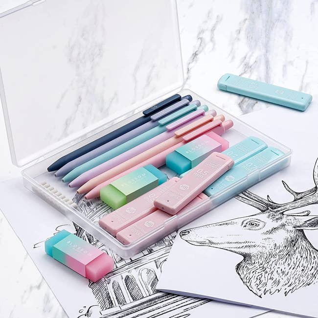 The set of mechanical pencils and accessories in shades of pink, purple, and blue 