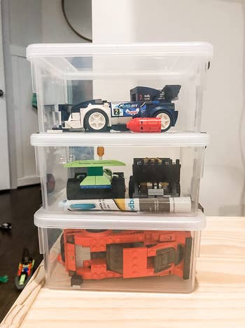 reviewer photo of LEGOs in stacked clear plastic bins