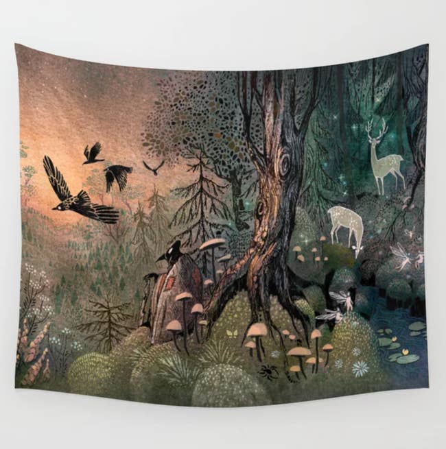 Tapestry with forest design and animals grazing along it