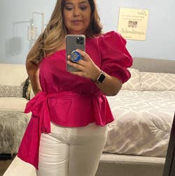 another reviewer wearing the pink belted top