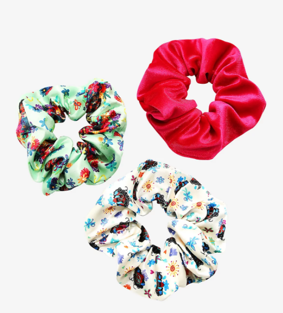 three encanto themed scrunchies