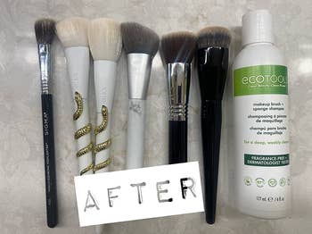 a reviewer's after photo of their clean makeup brushes next to the cleansing shampoo