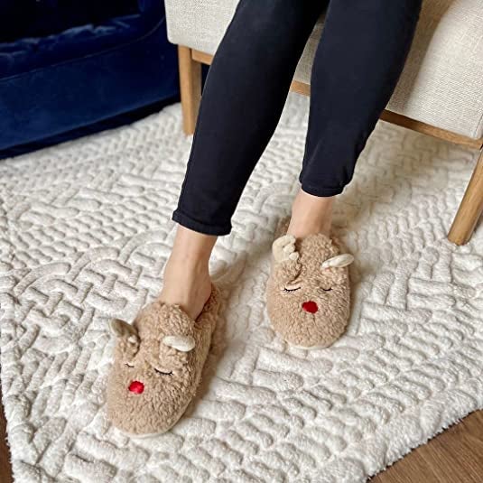 model wearing the reindeer slippers