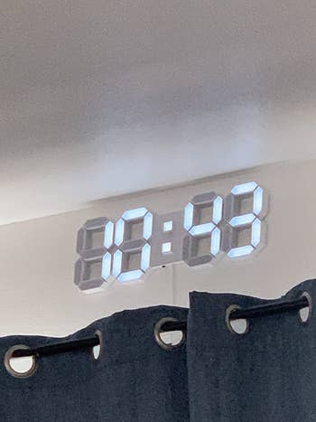 reviewer image of the LED clock on the wall