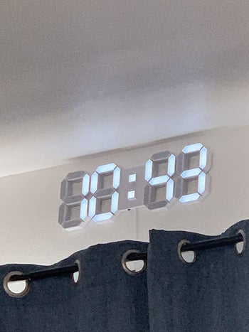 reviewer image of the LED clock on the wall