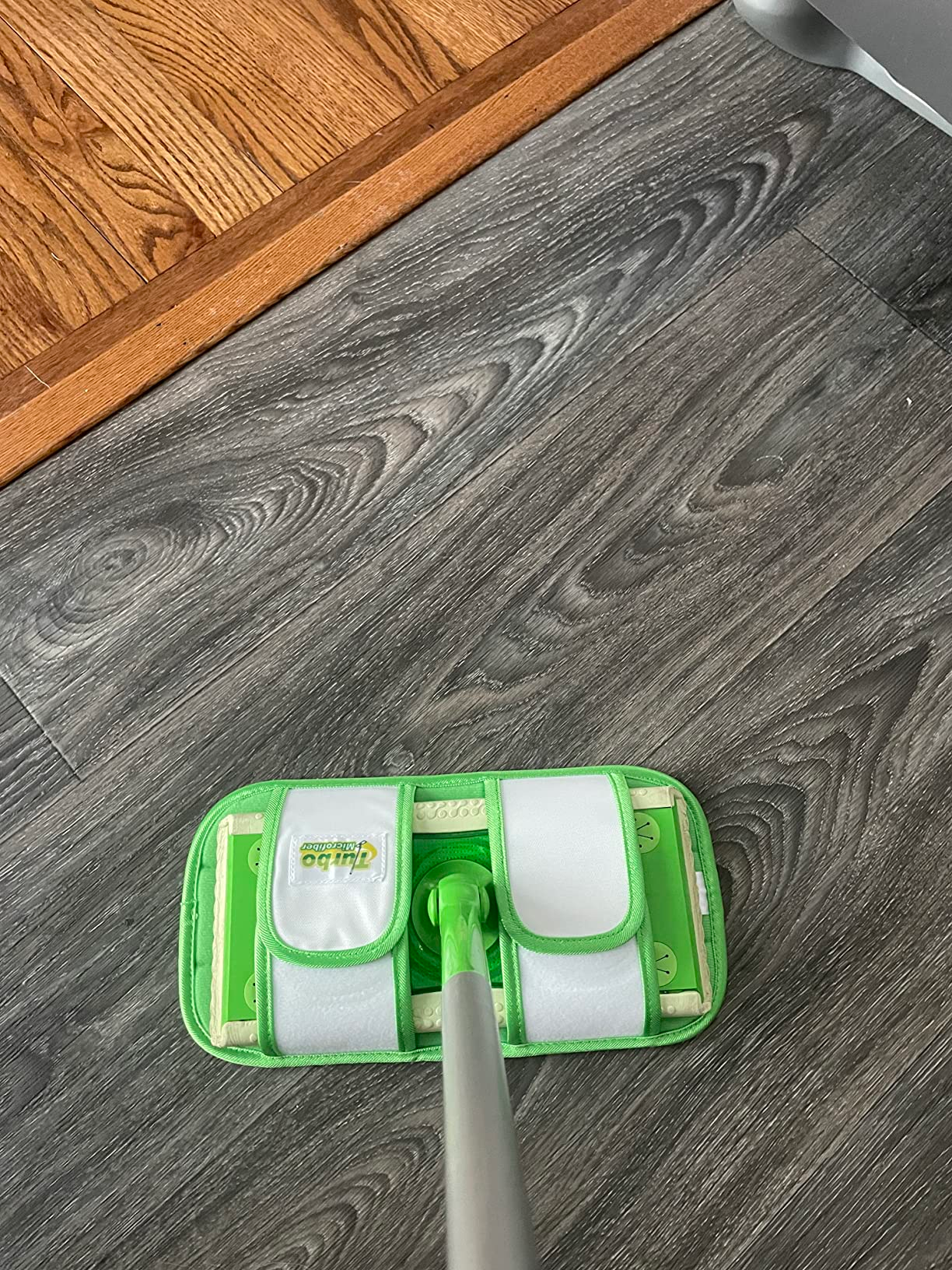 Reviewer&rsquo;s Swiffer with mop pad attached