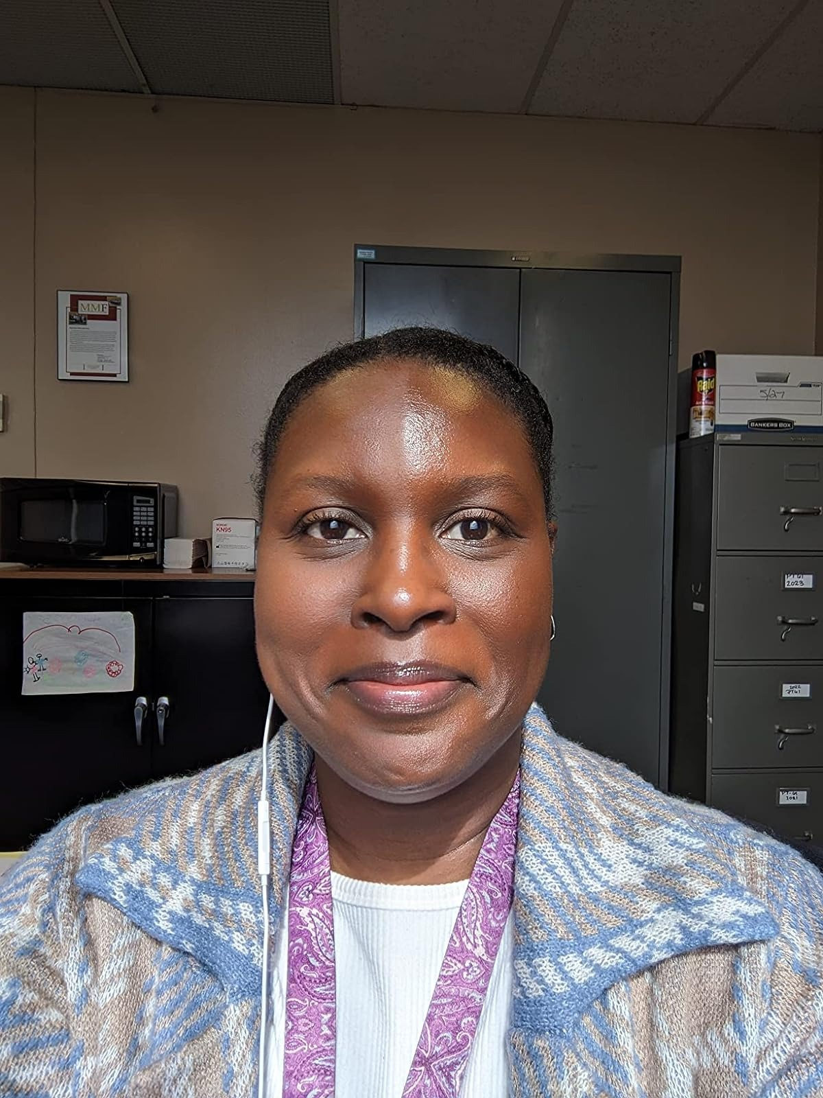 image of reviewer whose face is half matte and half oily