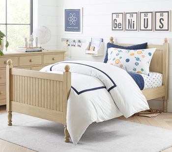 wooden kids' twin bed frame in kid's bedroom