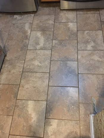 a reviewer's tile floors looking dirty from grout