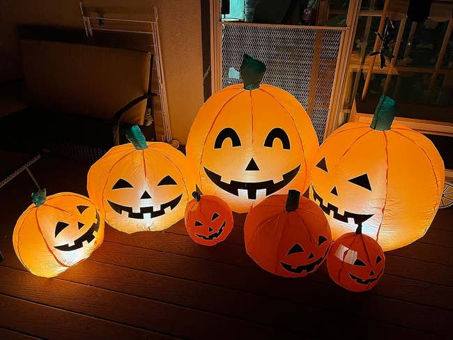 the seven inflatable pumpkins, four of which light up