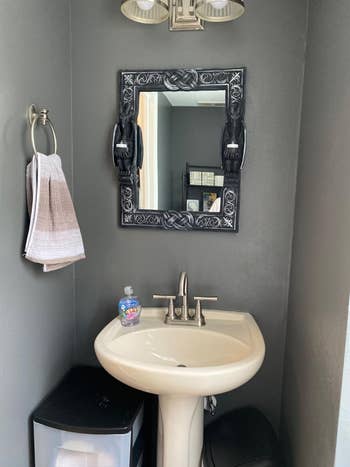 The mirror in a reviewer's bathroom above their sink