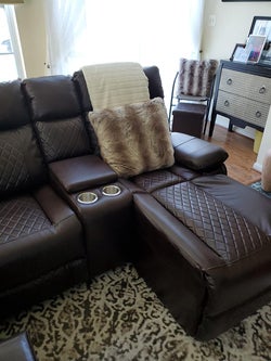 reviewer photo of closeup of reclining leather seat