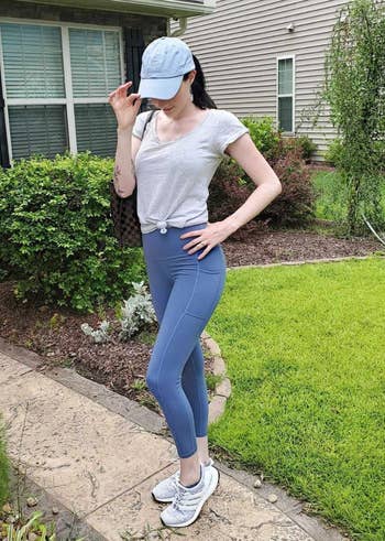reviewer in blue leggings with side pockets 