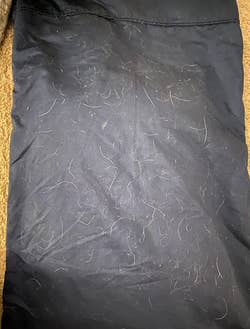 a reviewer's pillowcase covered in pet hair