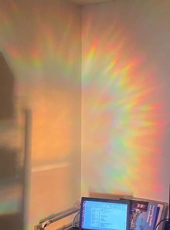 rainbows cast on the wall of a home office