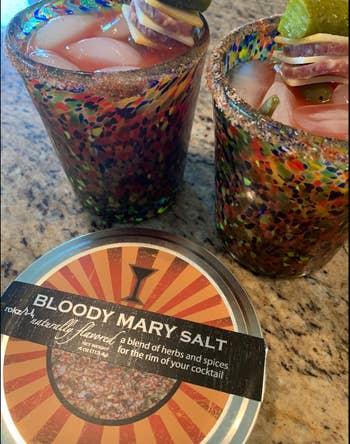 Reviewer with bloody mary salt on the rim of their cocktails 