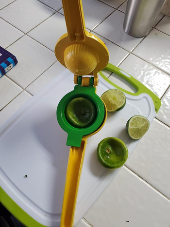 Reviewer pic of a juiced lime inside the device