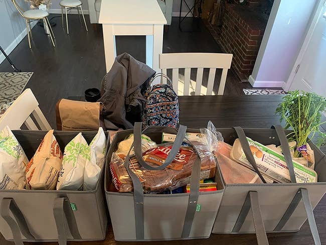 reviewer's three reusable bags filled with groceries