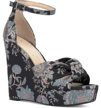 side view of a printed fabric sandal wedge