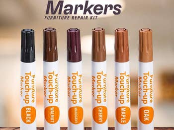 six wood colored markers