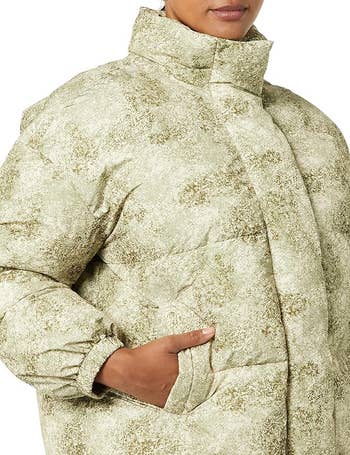 model in splatter print puffer jacket