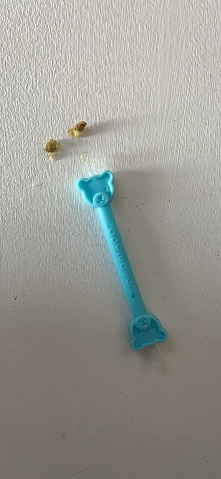 reviewer's instrumentality   with 2  dried boogers adjacent  to it