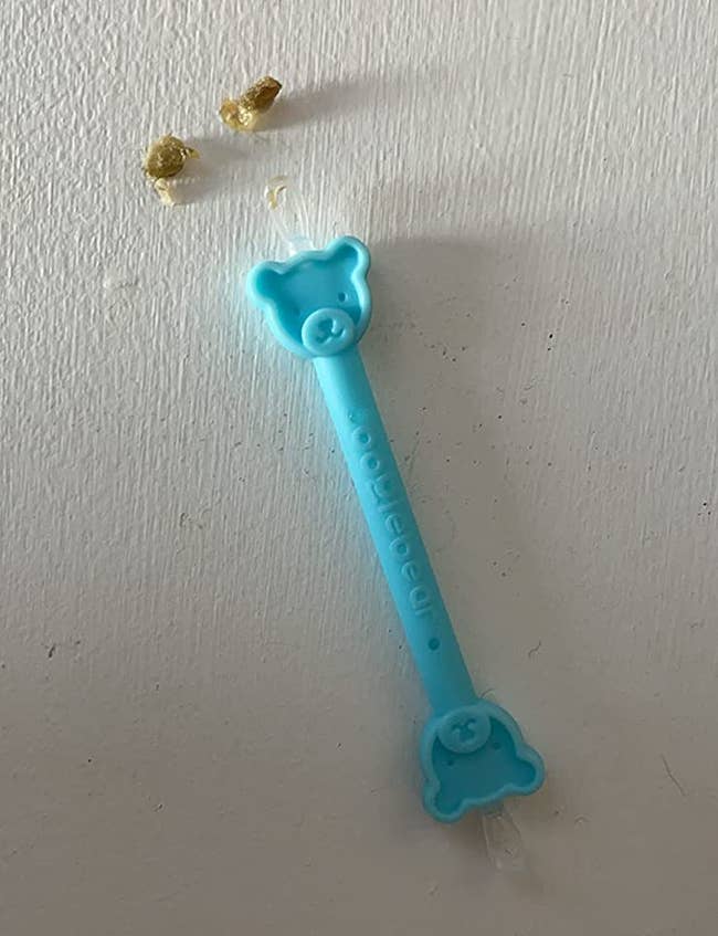 reviewer's instrumentality with 2 dried boogers adjacent to it