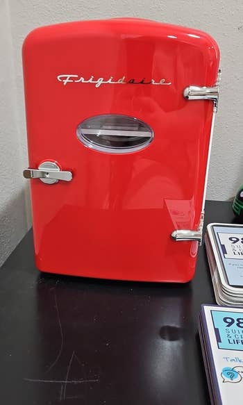Vintage-style Frigidaire mini refrigerator displayed on a countertop