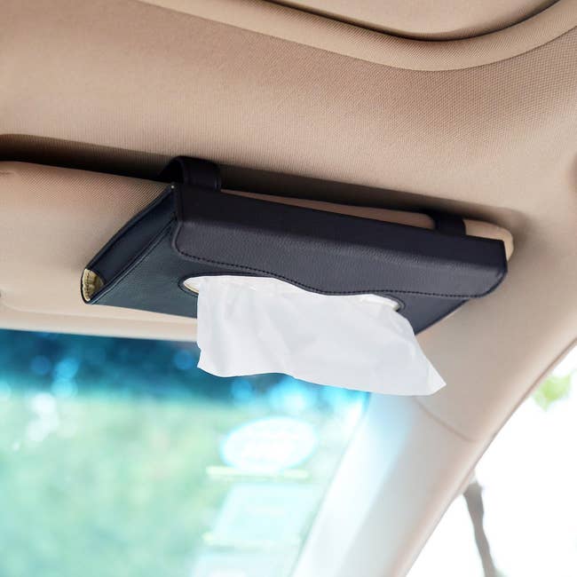 tissue holder on car's overhead folding visor