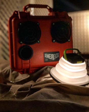 reviewer photo of collapsible camping lantern in a tent
