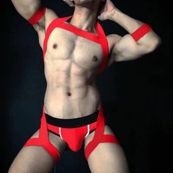 Model posing in red elastic bondage lingerie