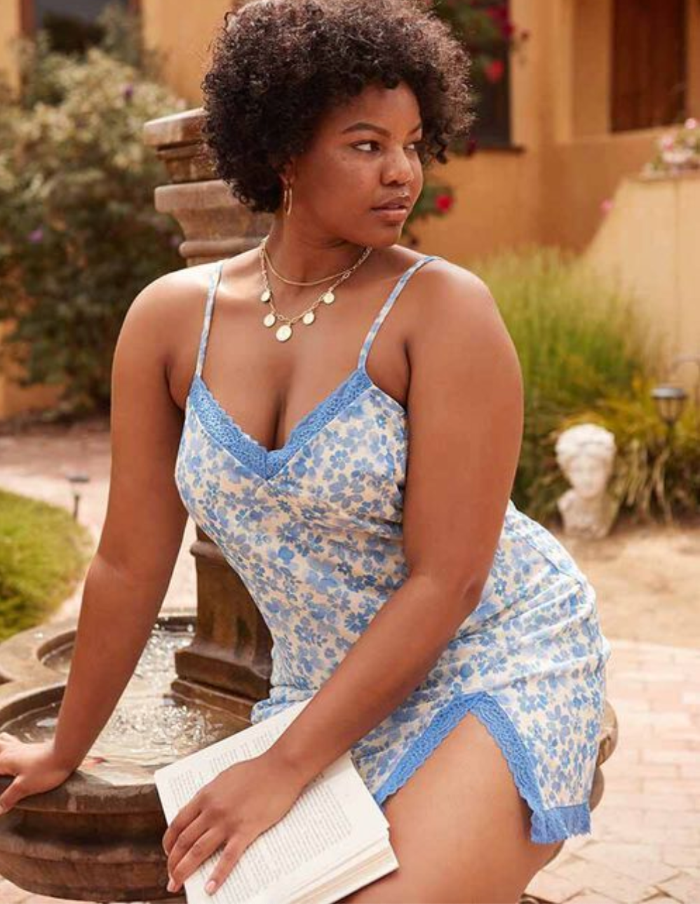 model wearing blue mini dress