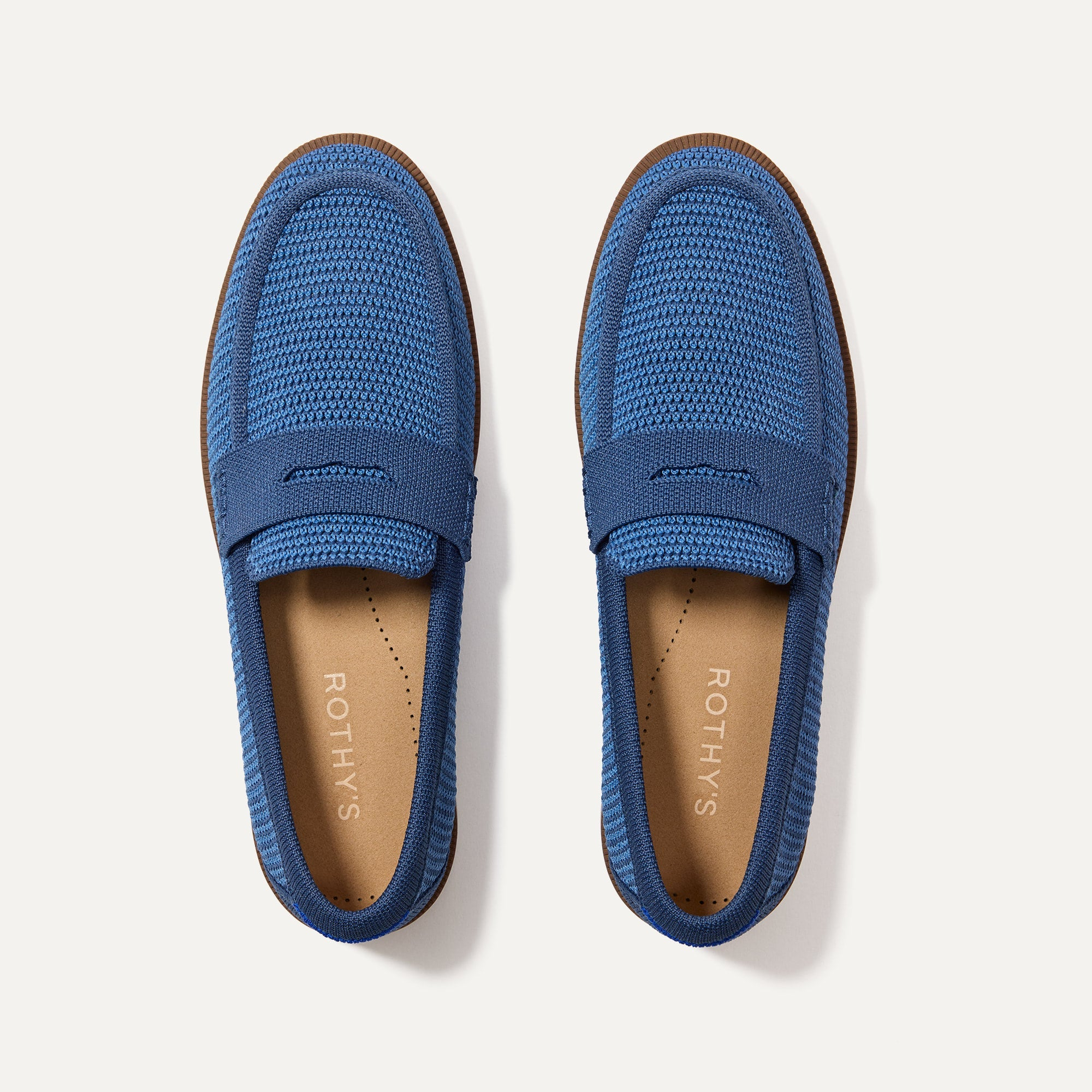 Top presumption    of bluish  Rothy’s slip-on shoes with textured pattern, suitable for casual wear