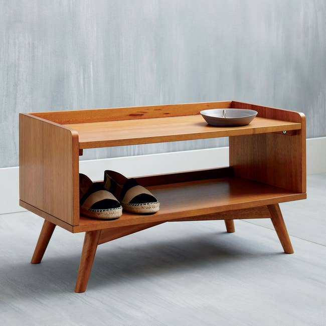 wooden footwear rack with slippers connected it