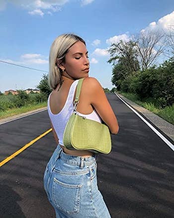 A different model with the green back and a white tank top